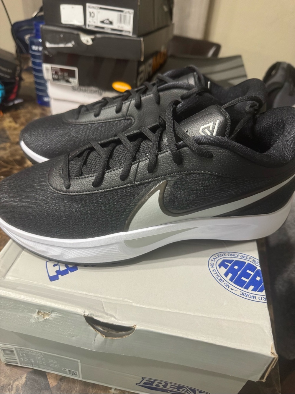 Nike Men’s Black Running Shoes with White Midsole and Gray Swoosh